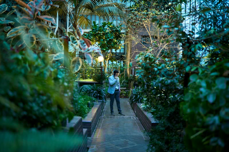 Executive business man talking on a mobile phone.